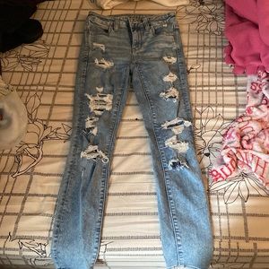 American Eagle, Size 0/short light/faded blue with rips